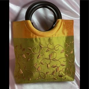 Silk embroidered mini bag with wood handled